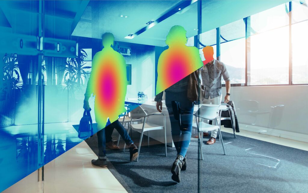 Thermal sensing identifies three humans in an office.